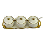 Golden and white teapot