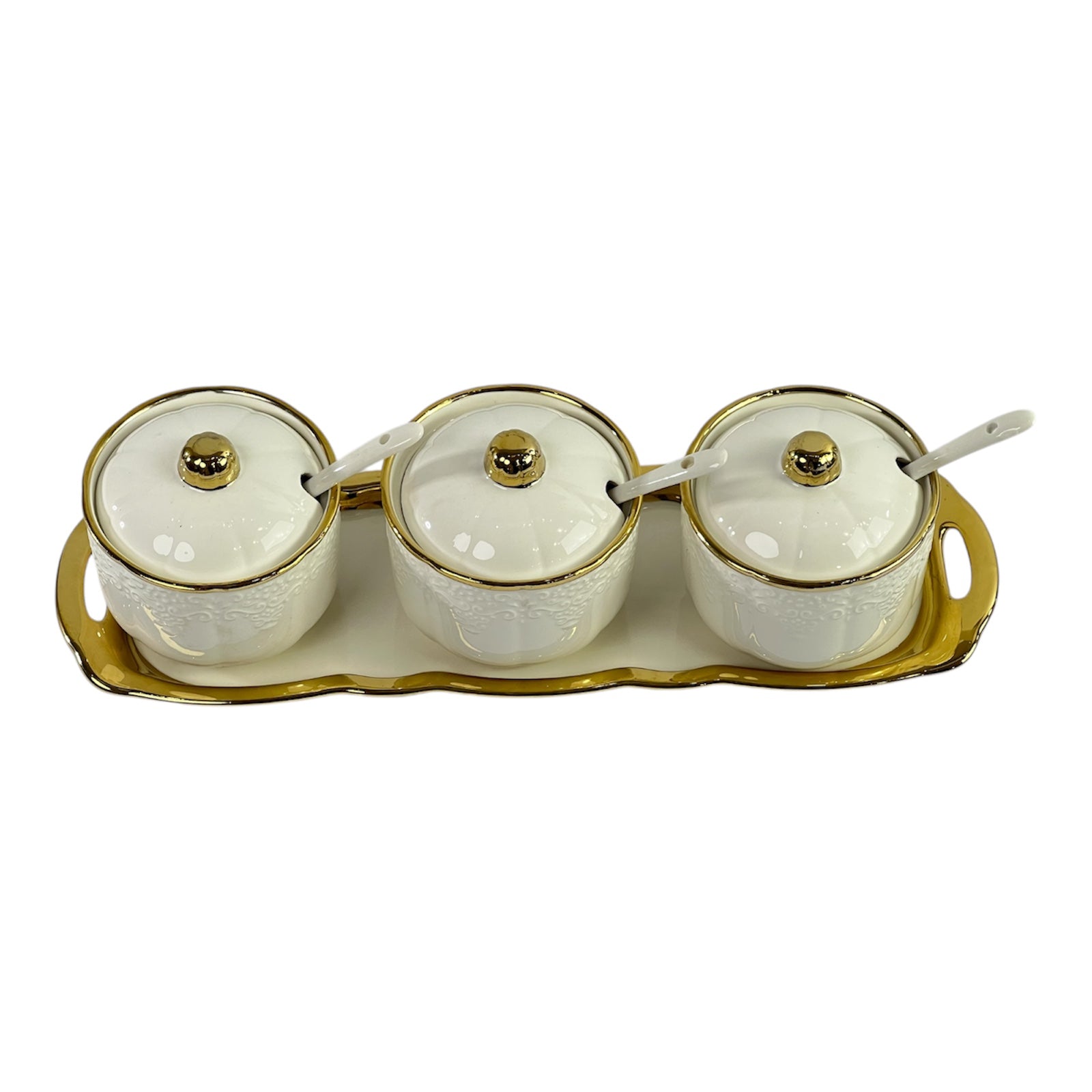 Golden and white teapot
